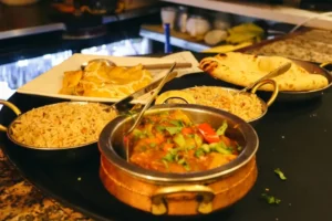 First-time Indian restaurant order of naan, rice and starters at The India, Cannon Street